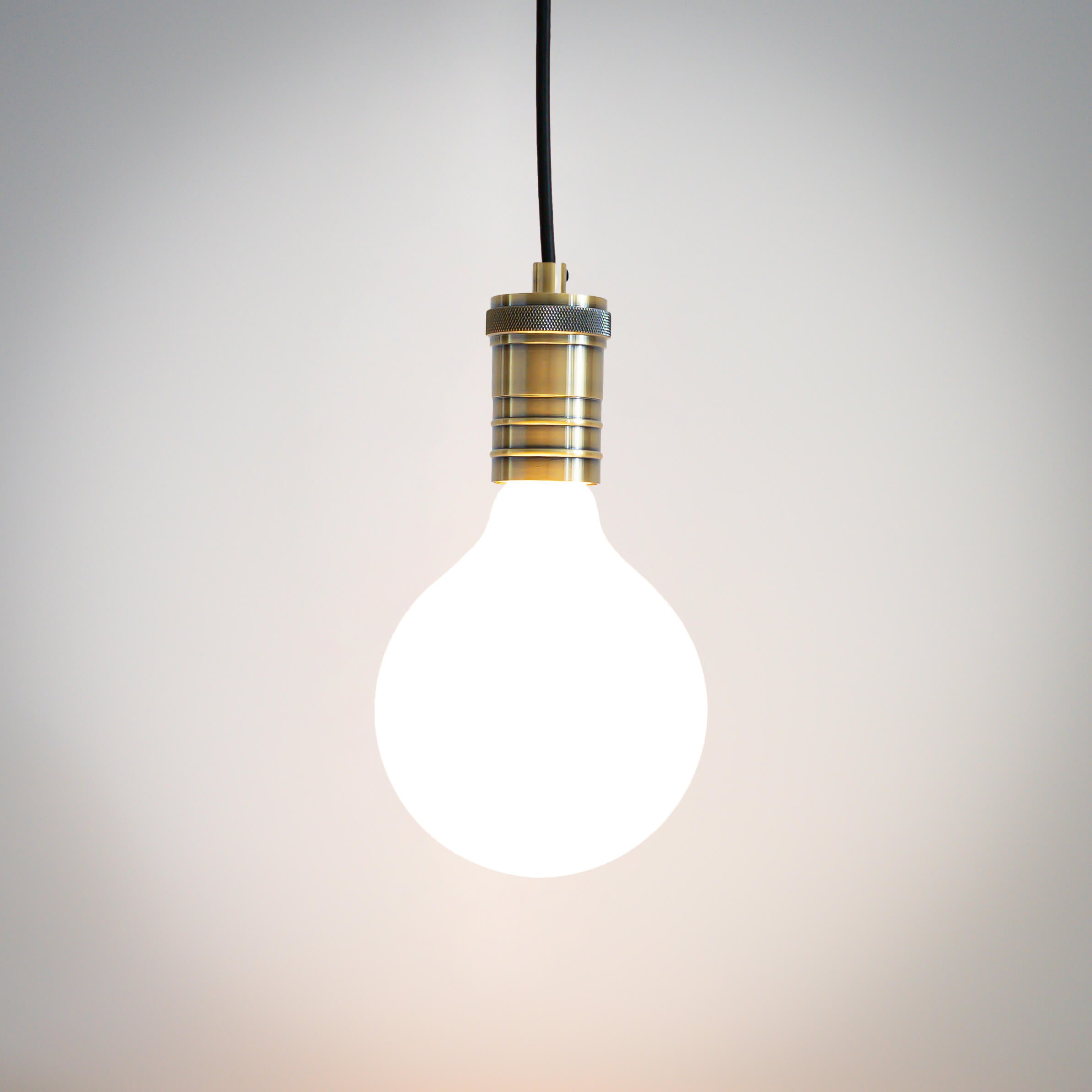 antique bronze pendant light with straight cable and luna bulb on