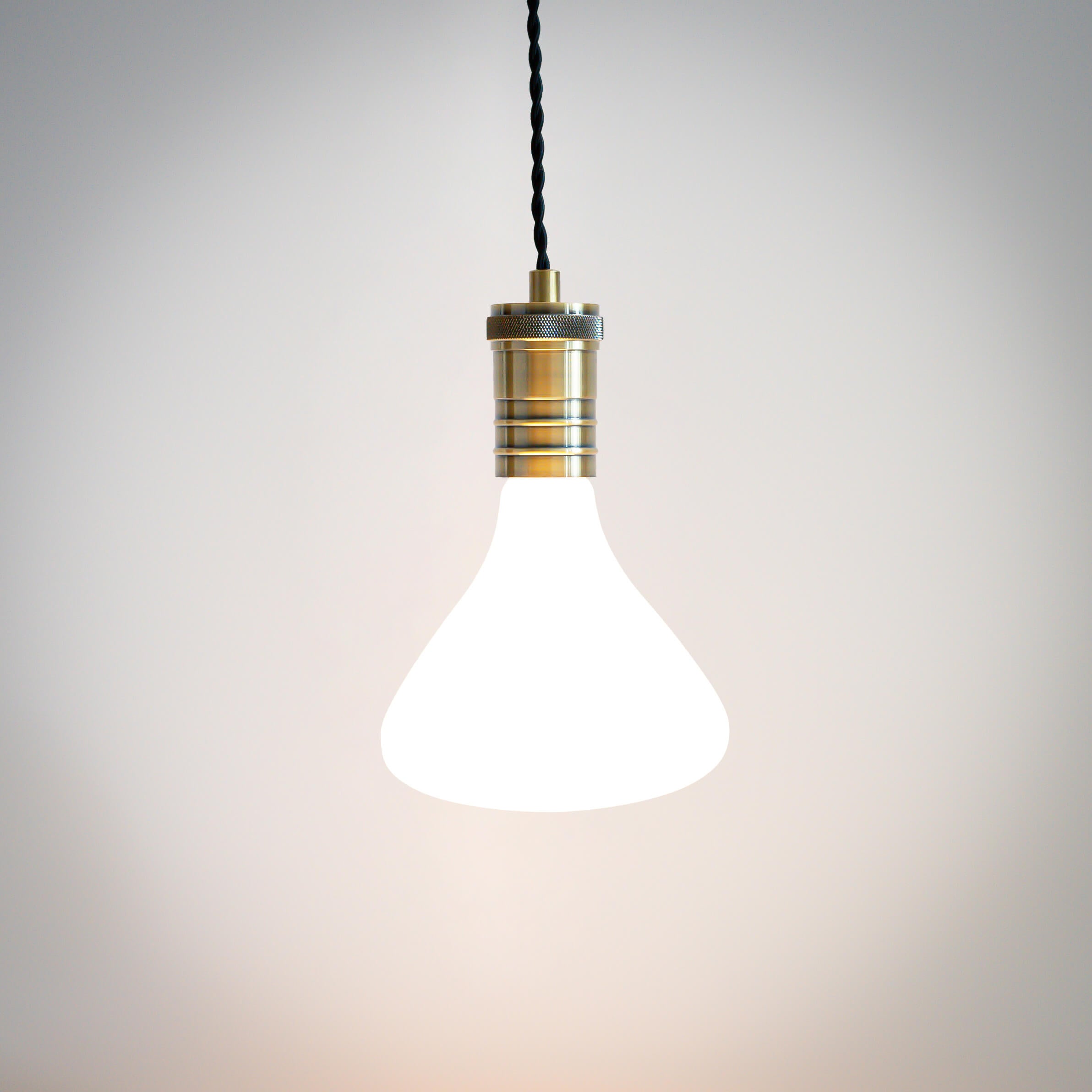 antique bronze pendant light with twisted cable and astrid bulb on