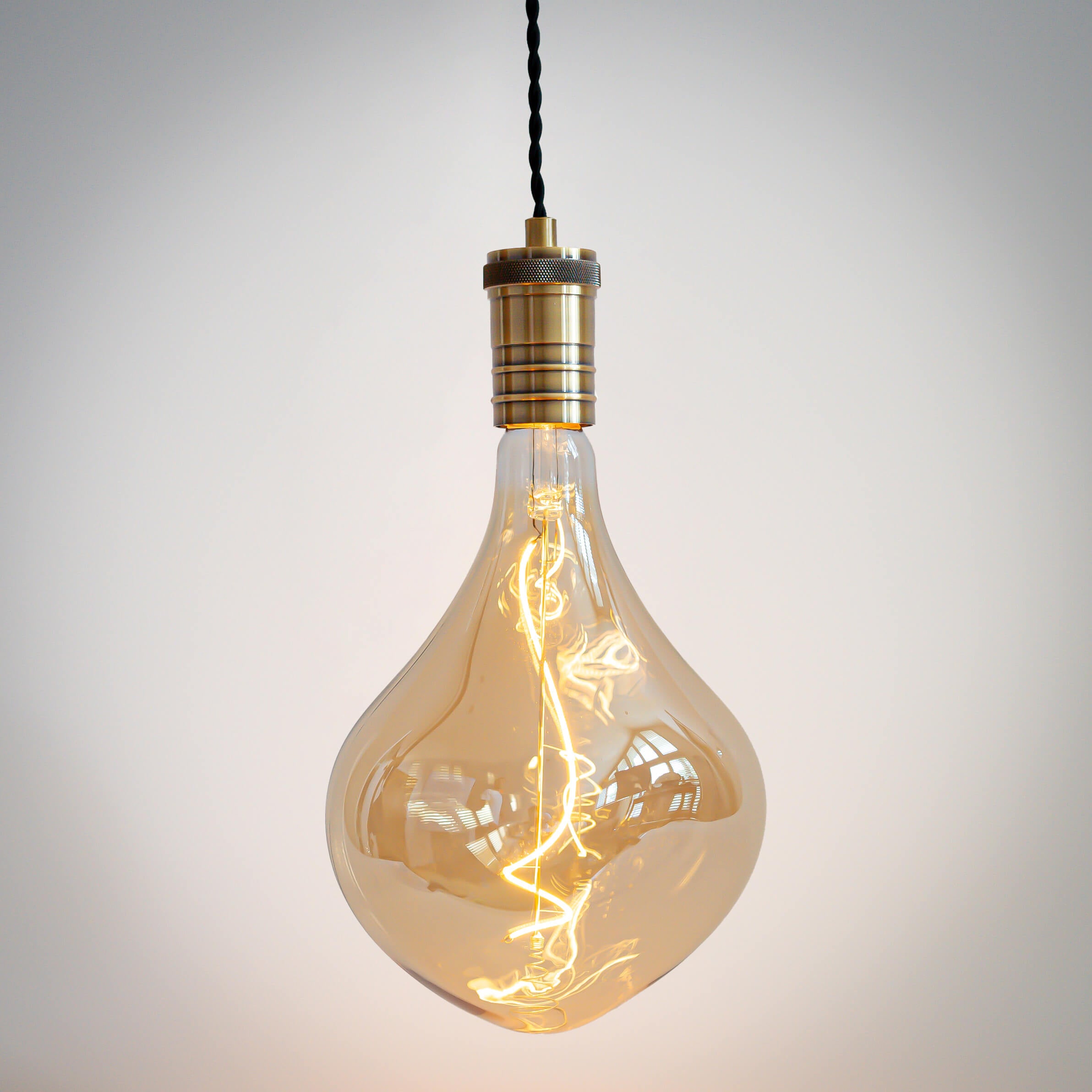 antique bronze pendant light with twisted cable and céleste bulb on