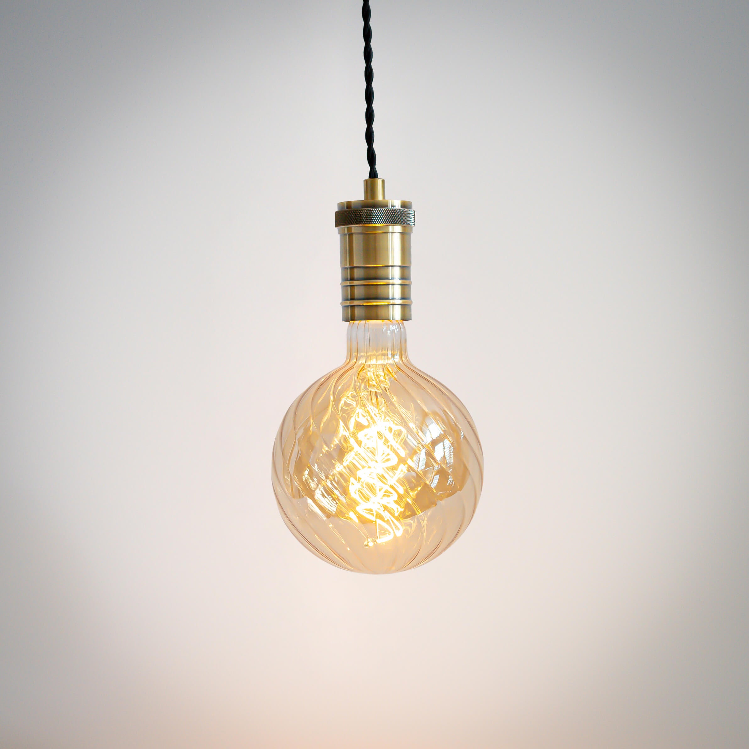 antique bronze pendant light with twisted cable and felicity bulb on