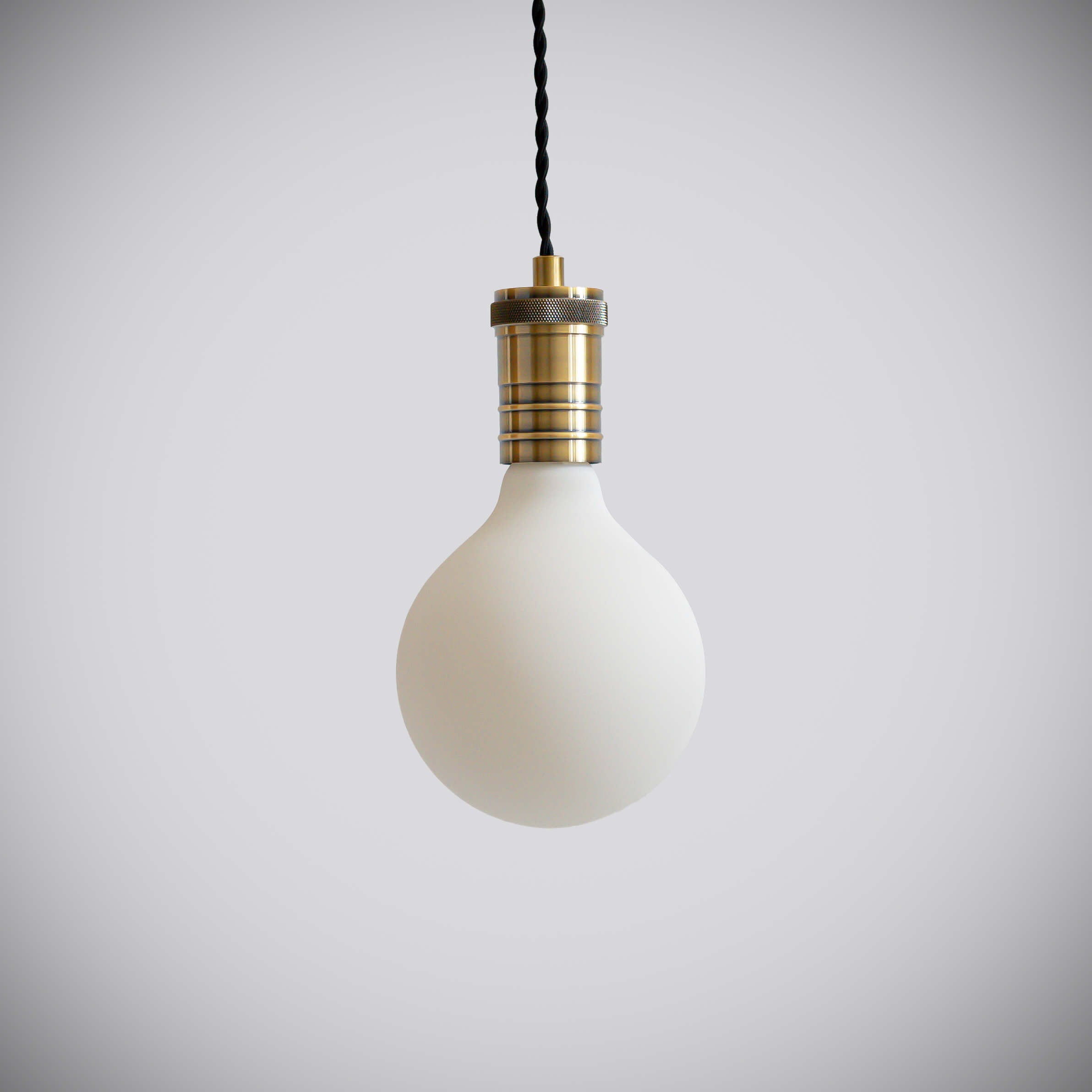 antique bronze pendant light with twisted cable and luna bulb off