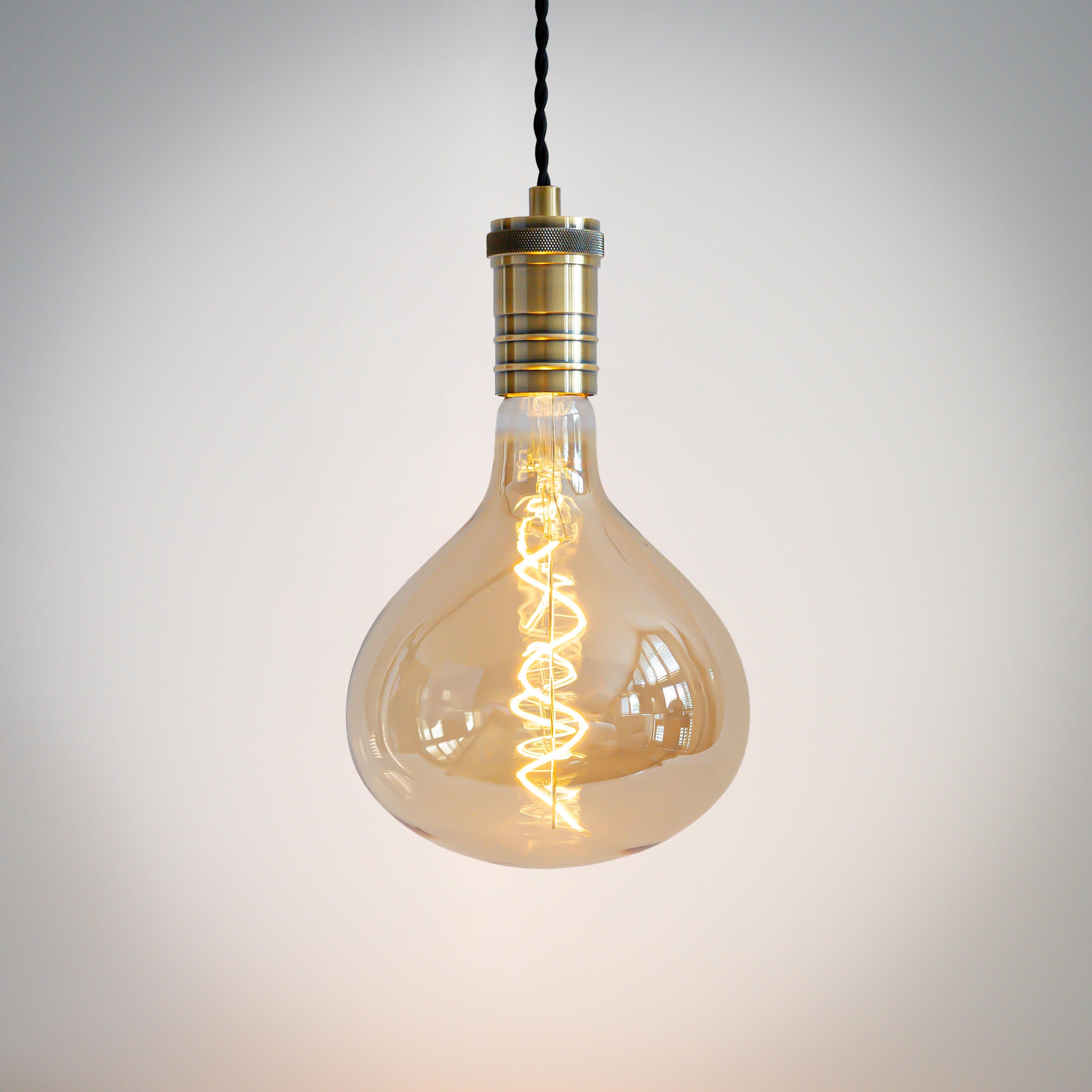 antique bronze pendant light with twisted cable and olivia bulb on
