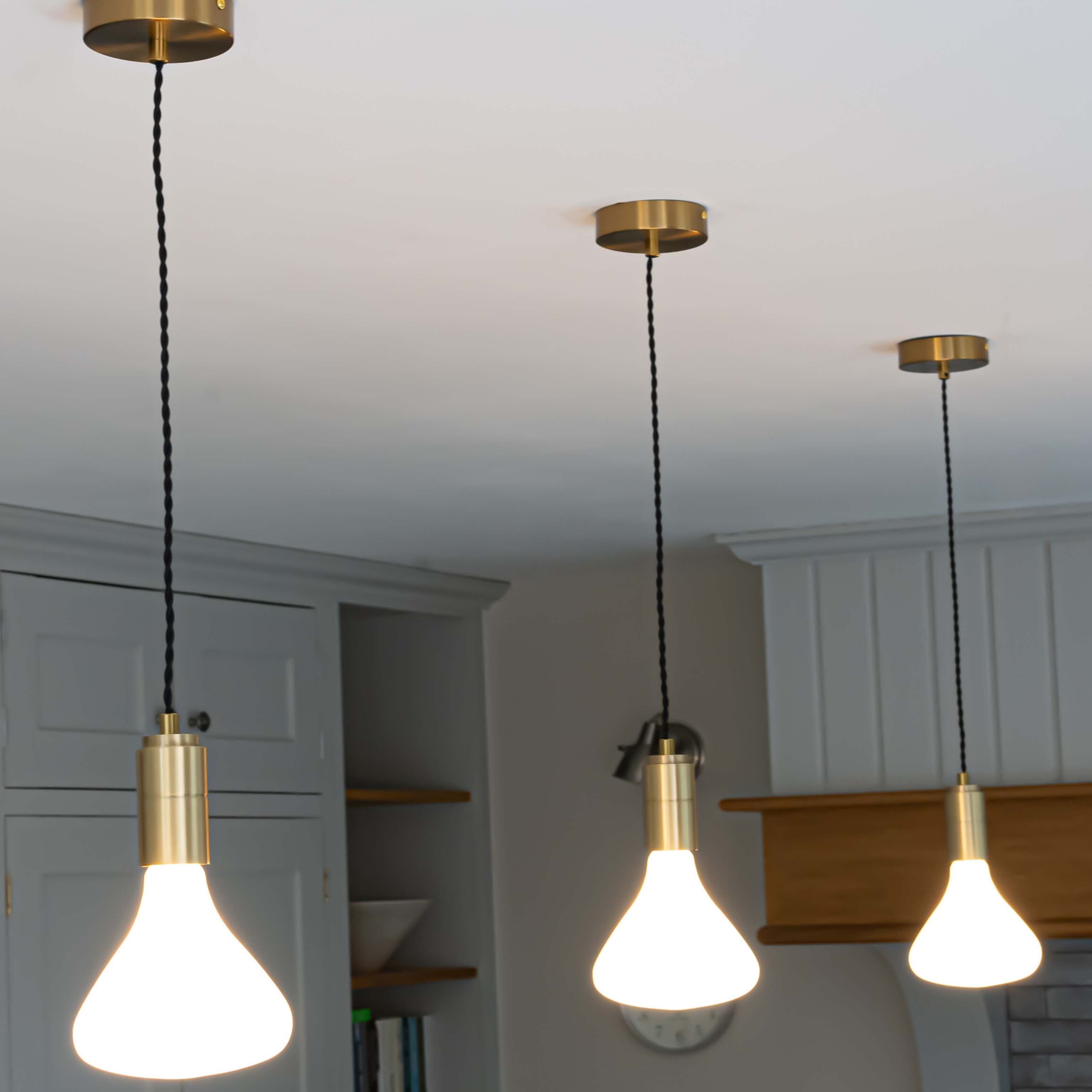 Astrid brass pendant light three in a row