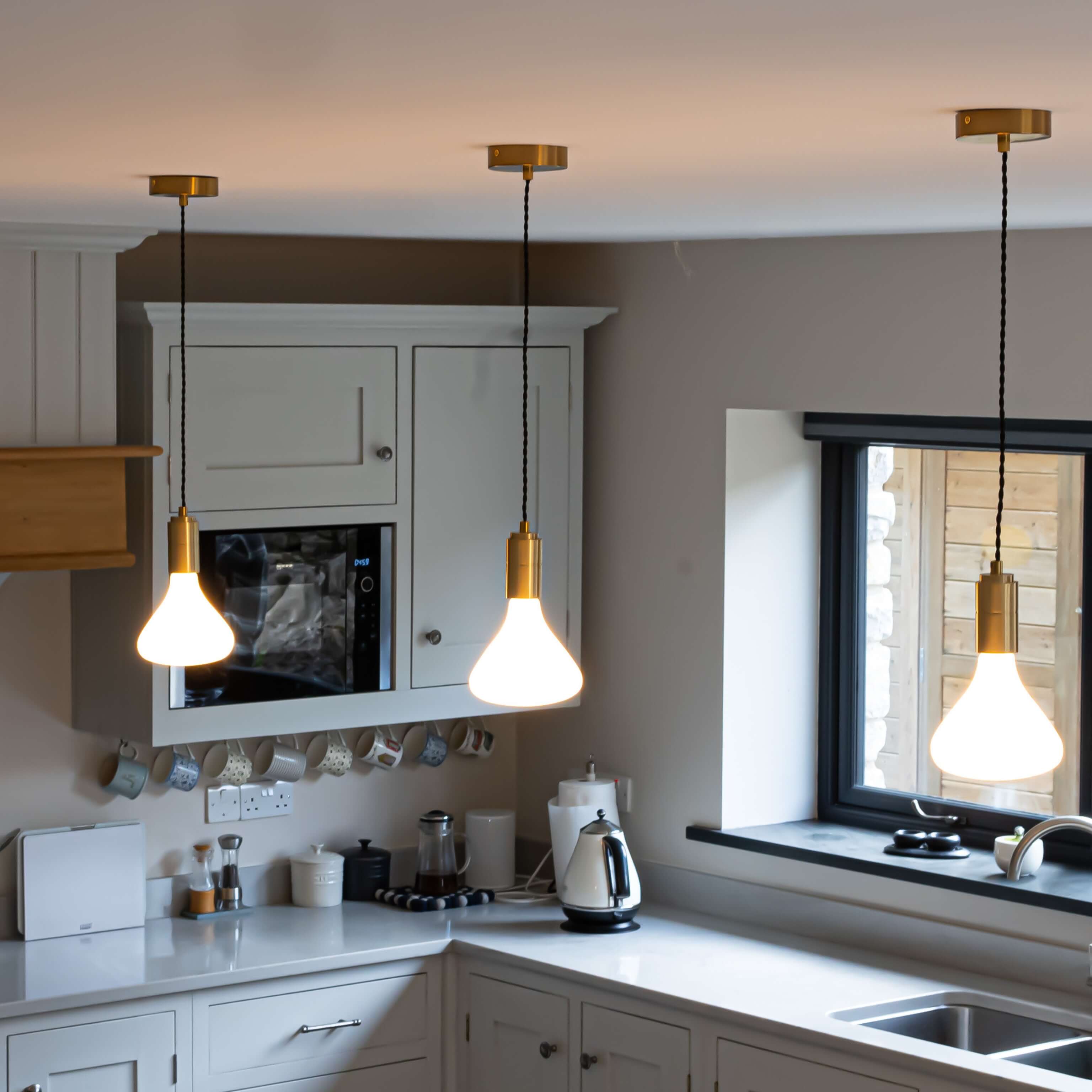Astrid brass pendant light wide angle