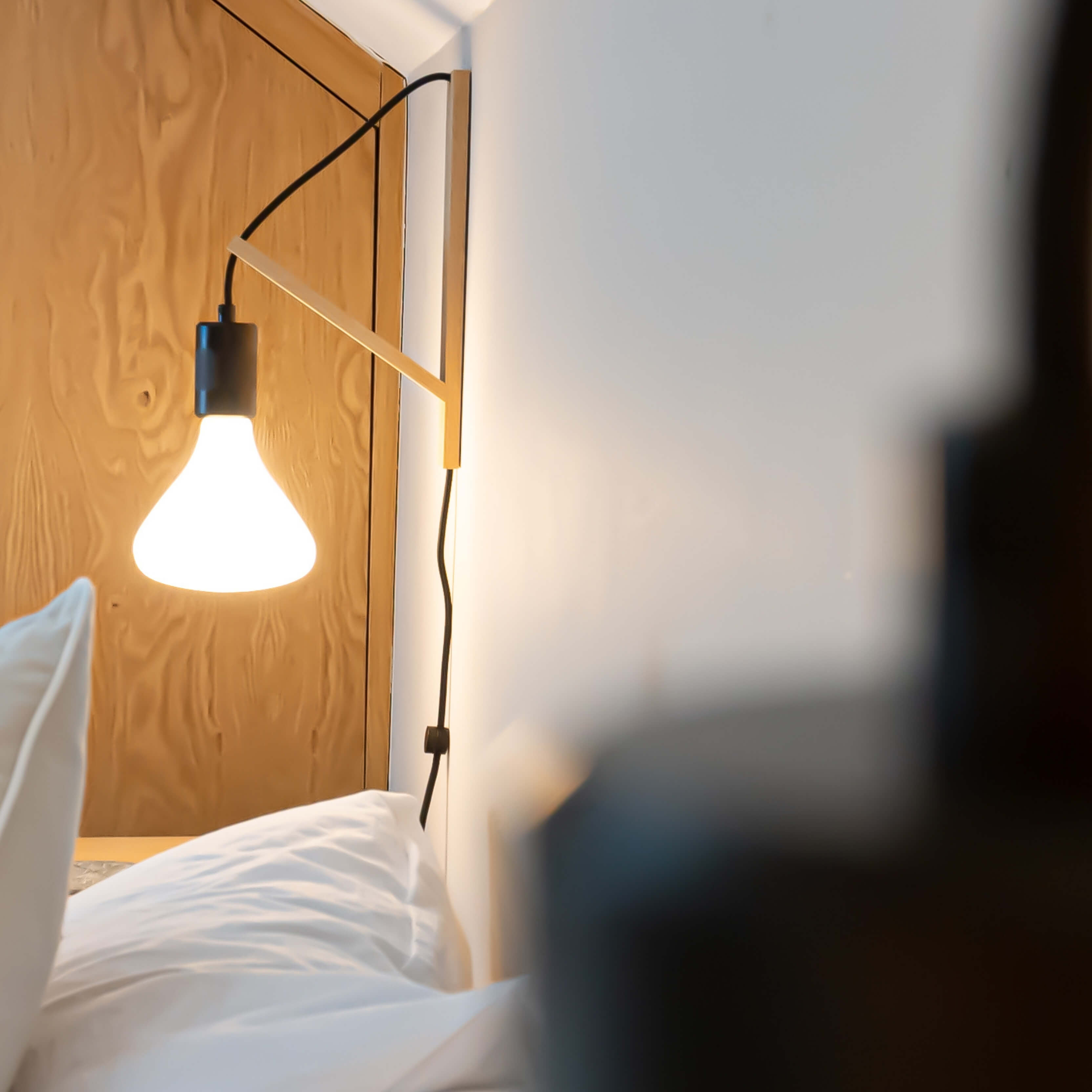 black plug in bedside wall light mount focus