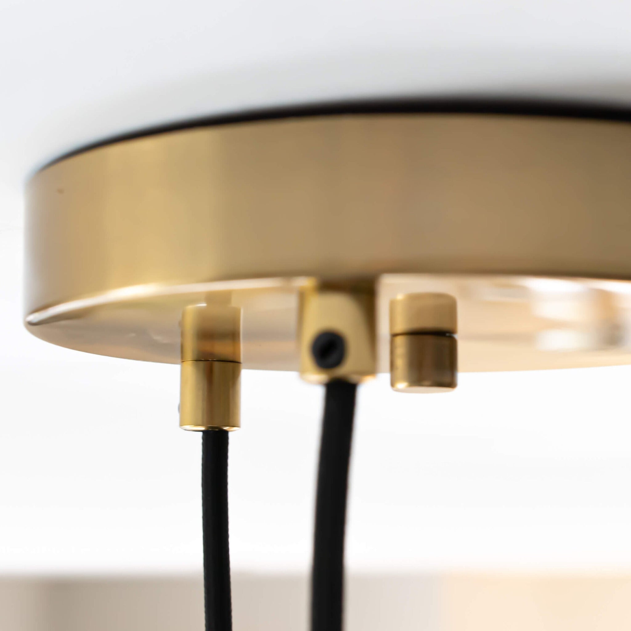 brass cluster pendant lights straight cable ceiling rose closeup