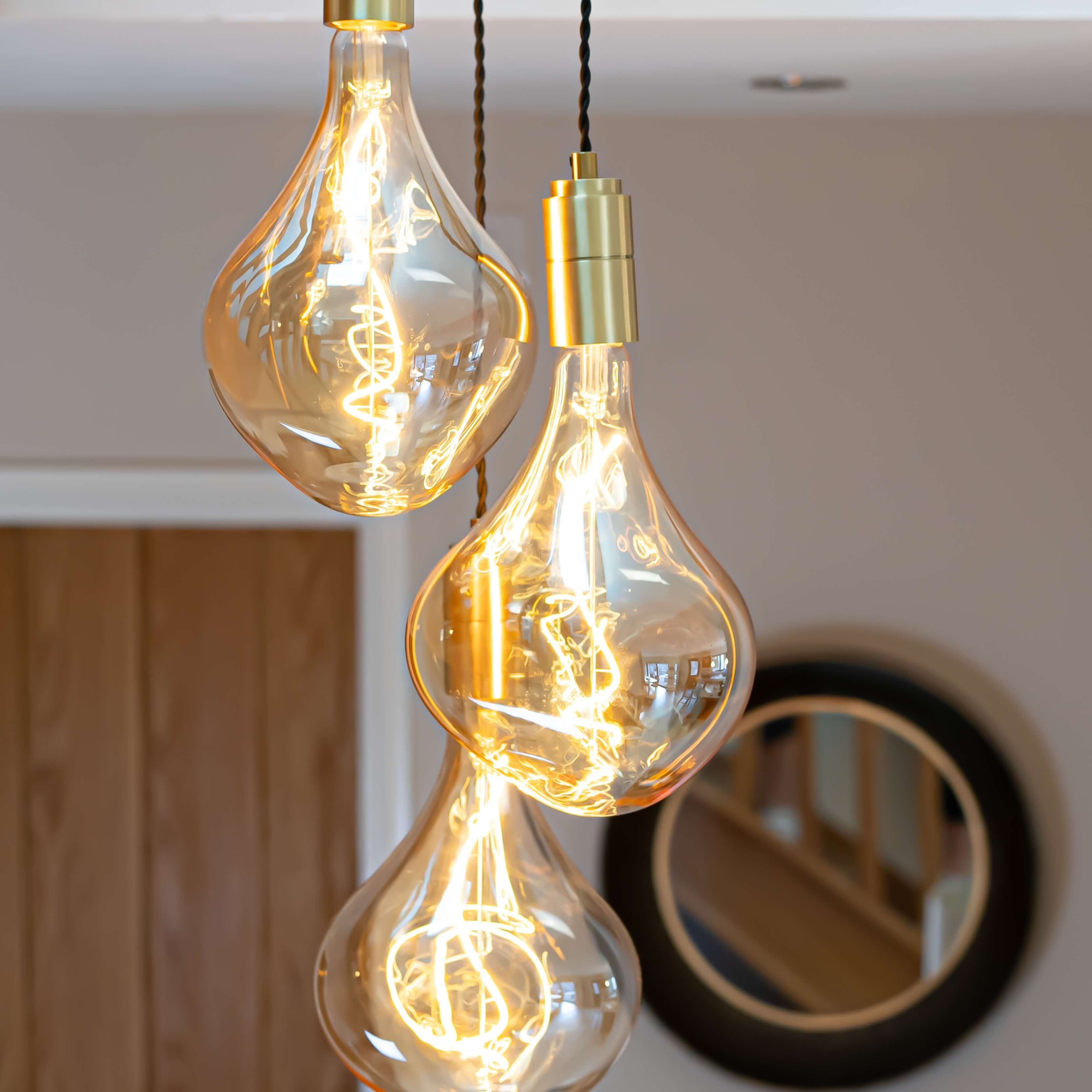 Brass cluster pendant with twisted cable and Celeste bulbs focus