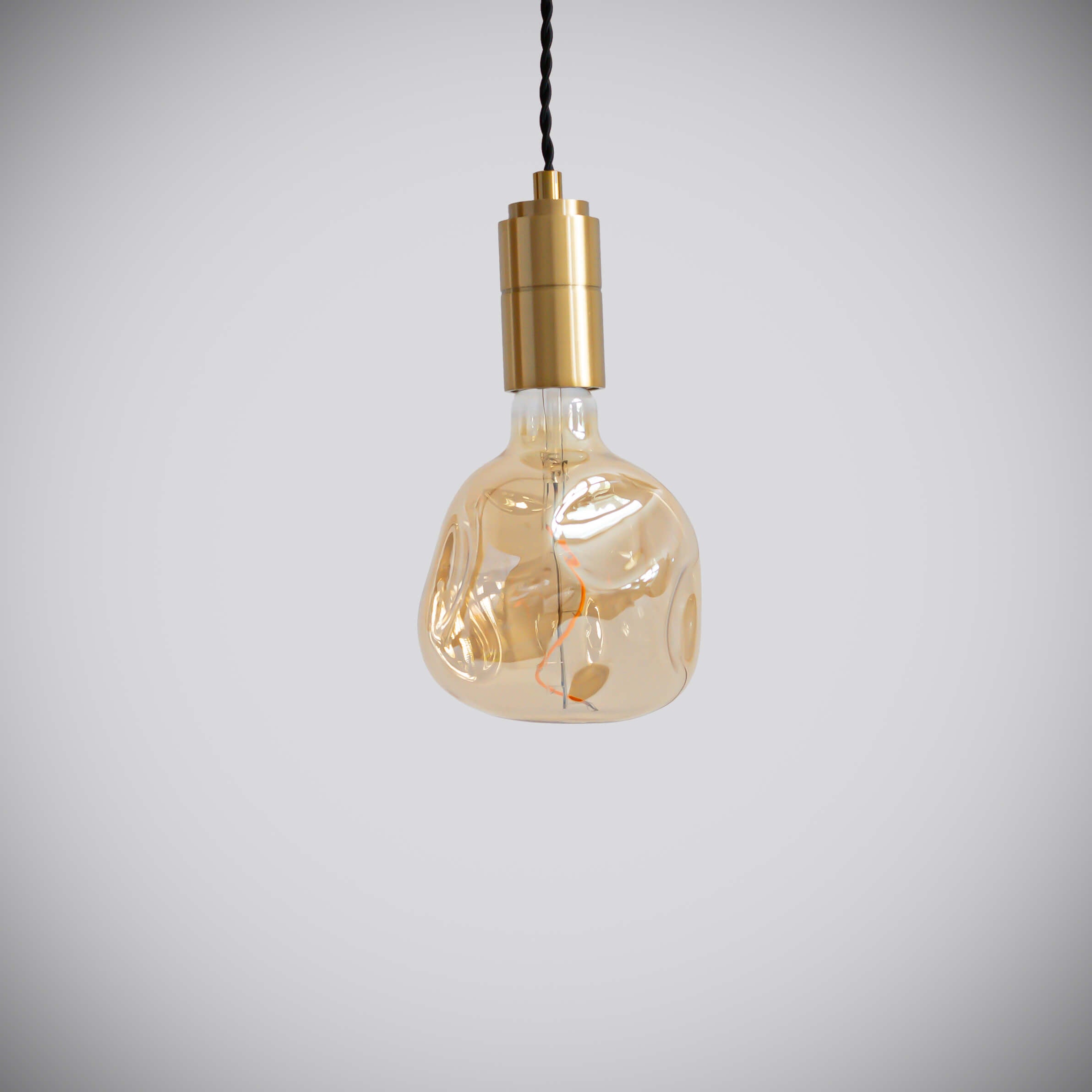 brass pendant light with twisted cable and isabella bulb off