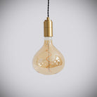 brass pendant light with twisted cable and olivia bulb off