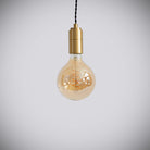 brass pendant light with twisted cable and sophia bulb off