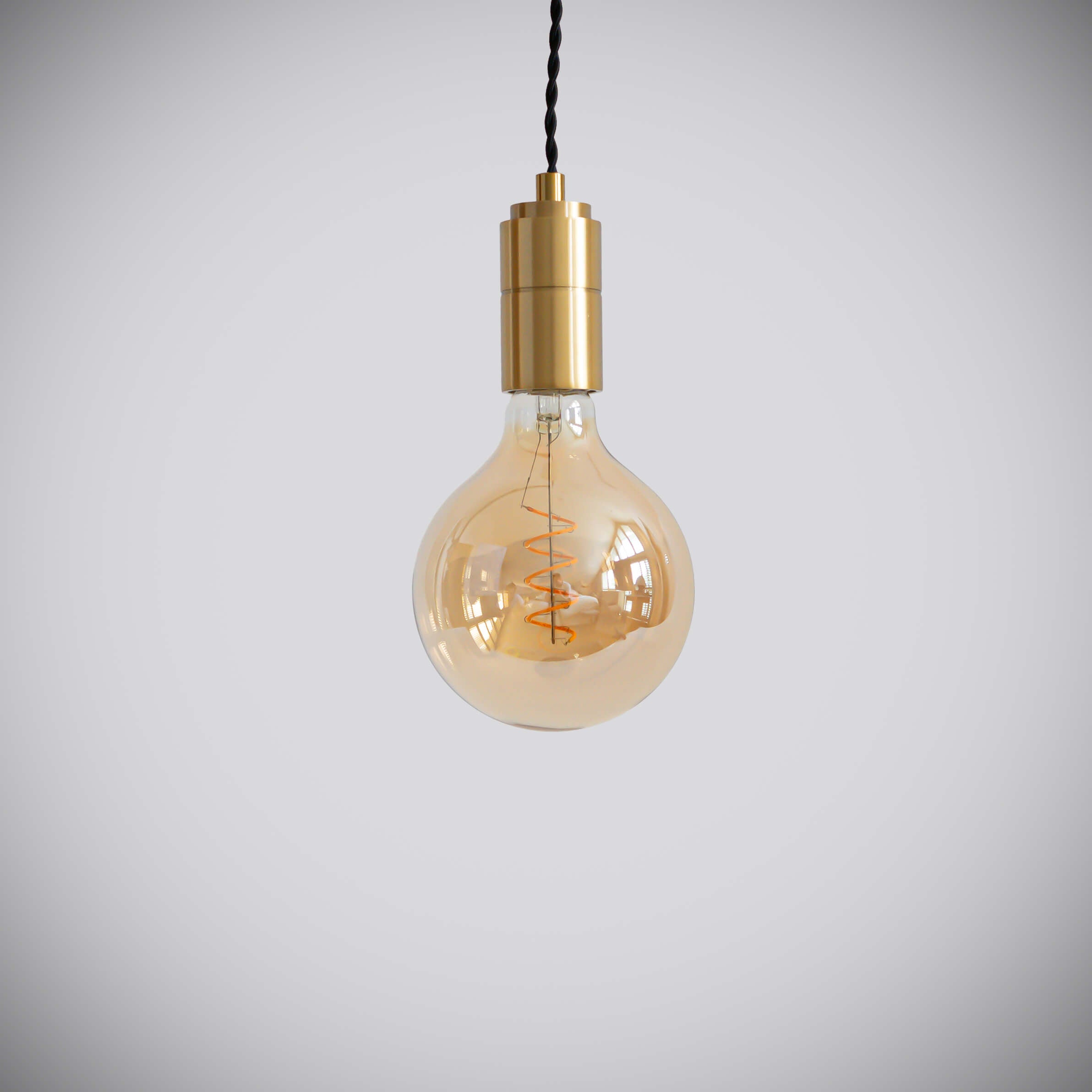 brass pendant light with twisted cable and sophia bulb off