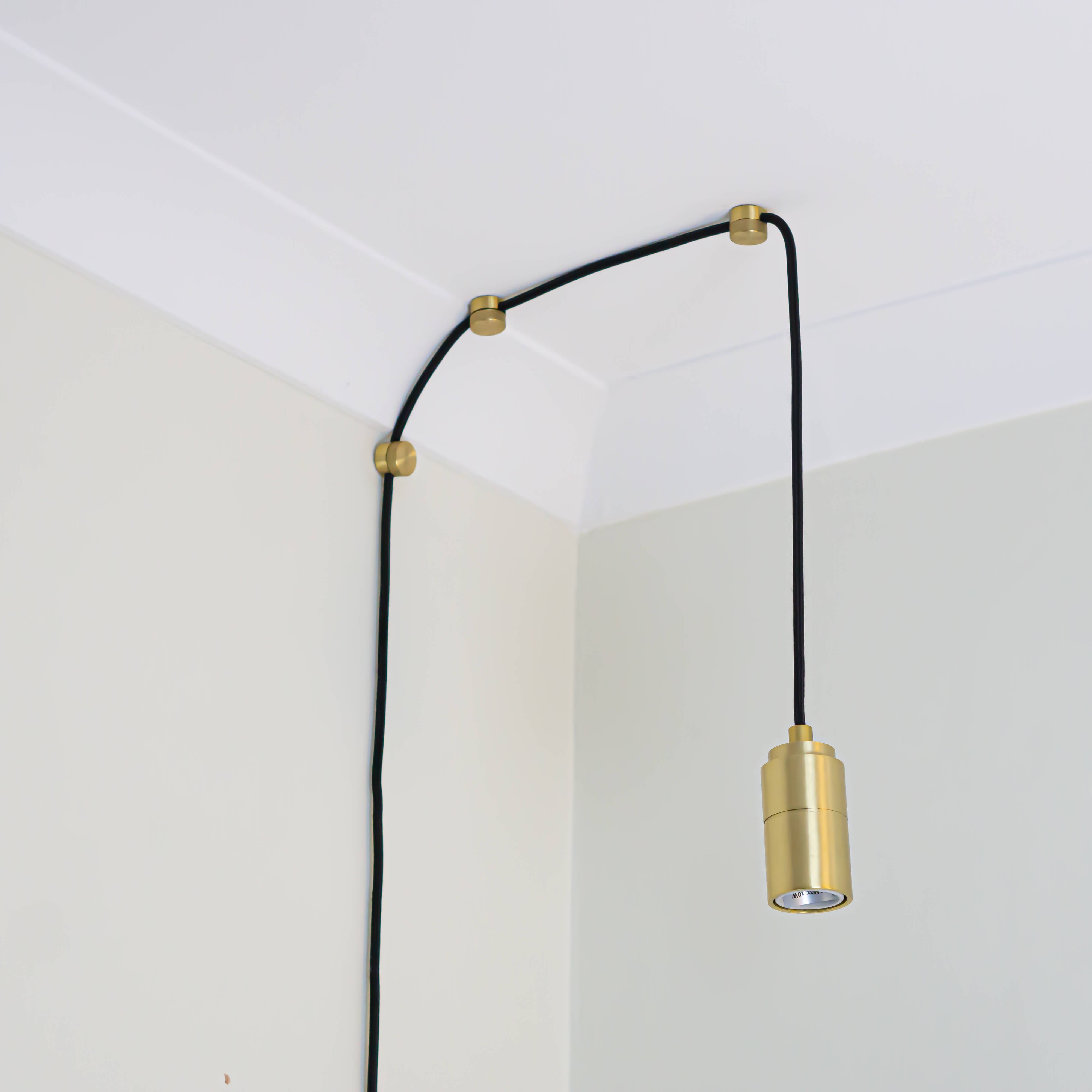 brass plug in pendant light with straight cable assembled with no bulb
