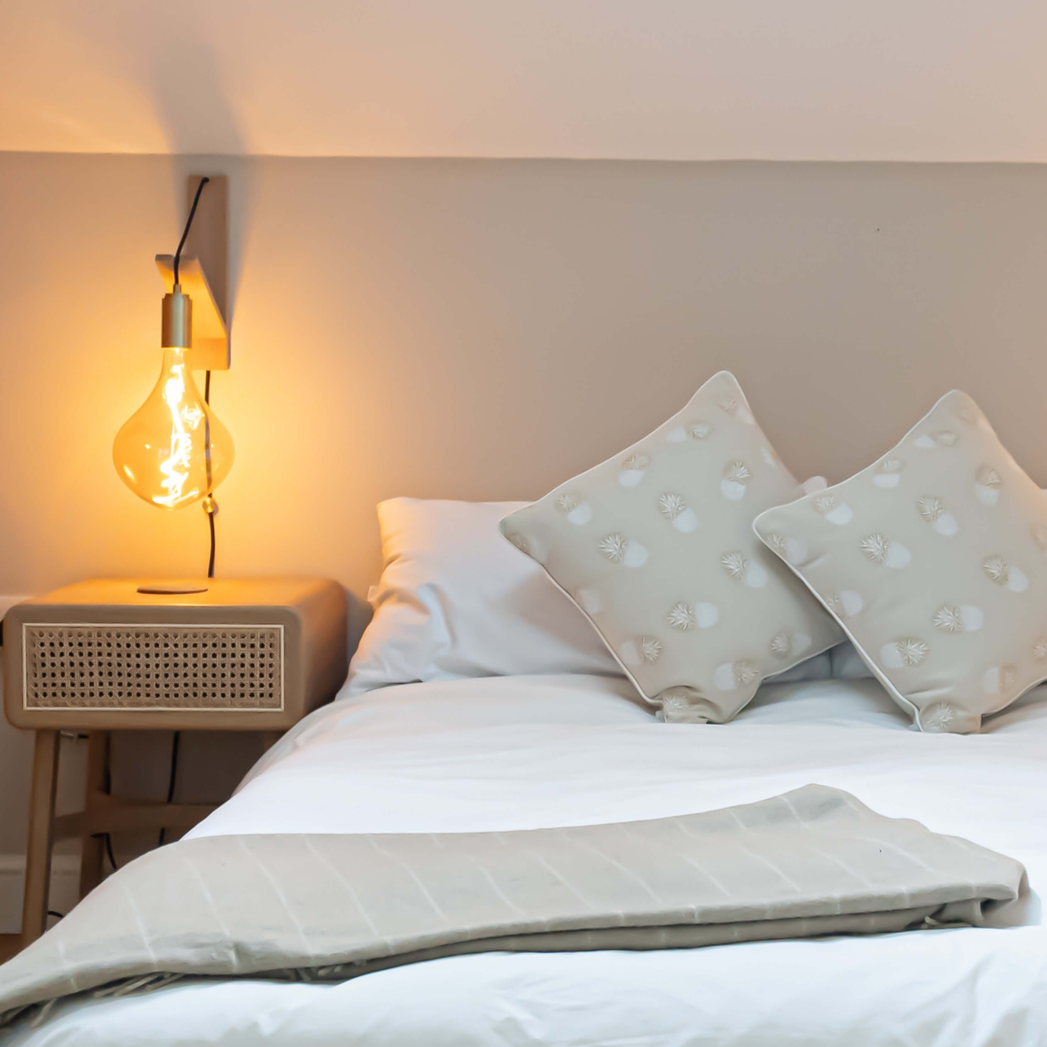 brass plug in wall light in brass in the bedroom closeup