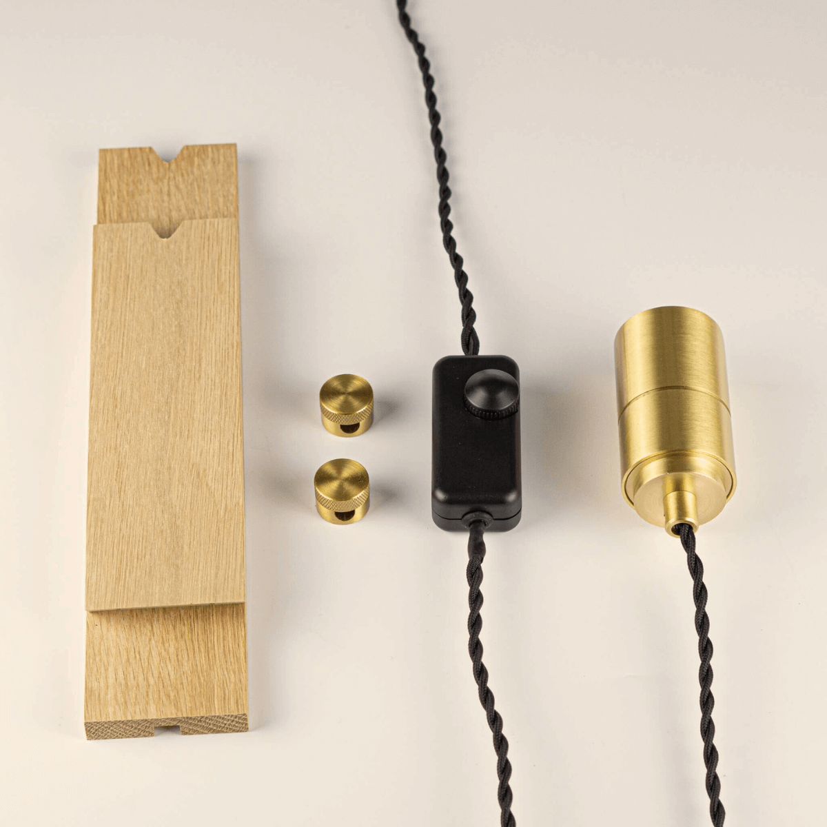 brass plug in wall light with twisted cable components