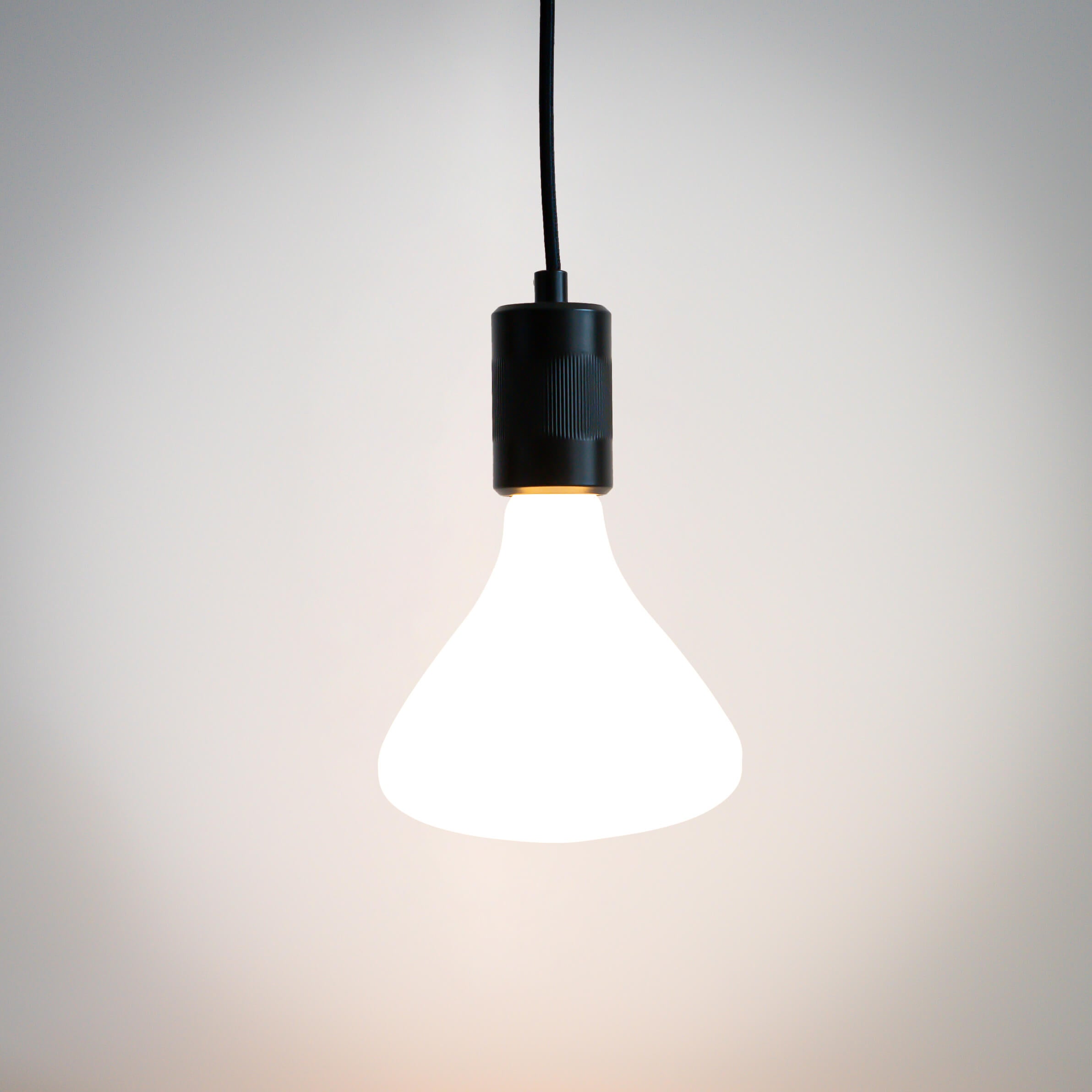 matte black pendant light and astrid bulb on