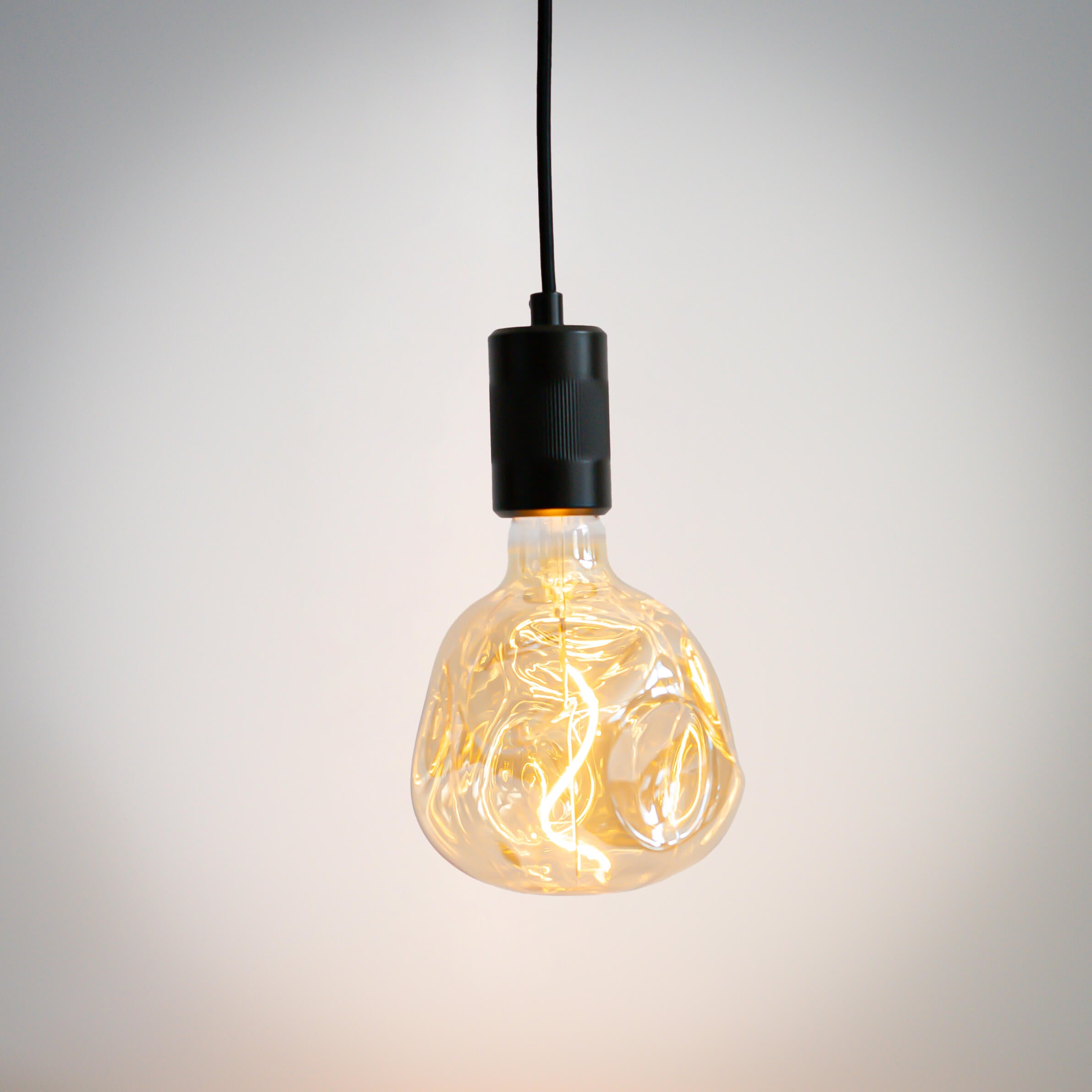 matte black pendant light and isabella bulb on