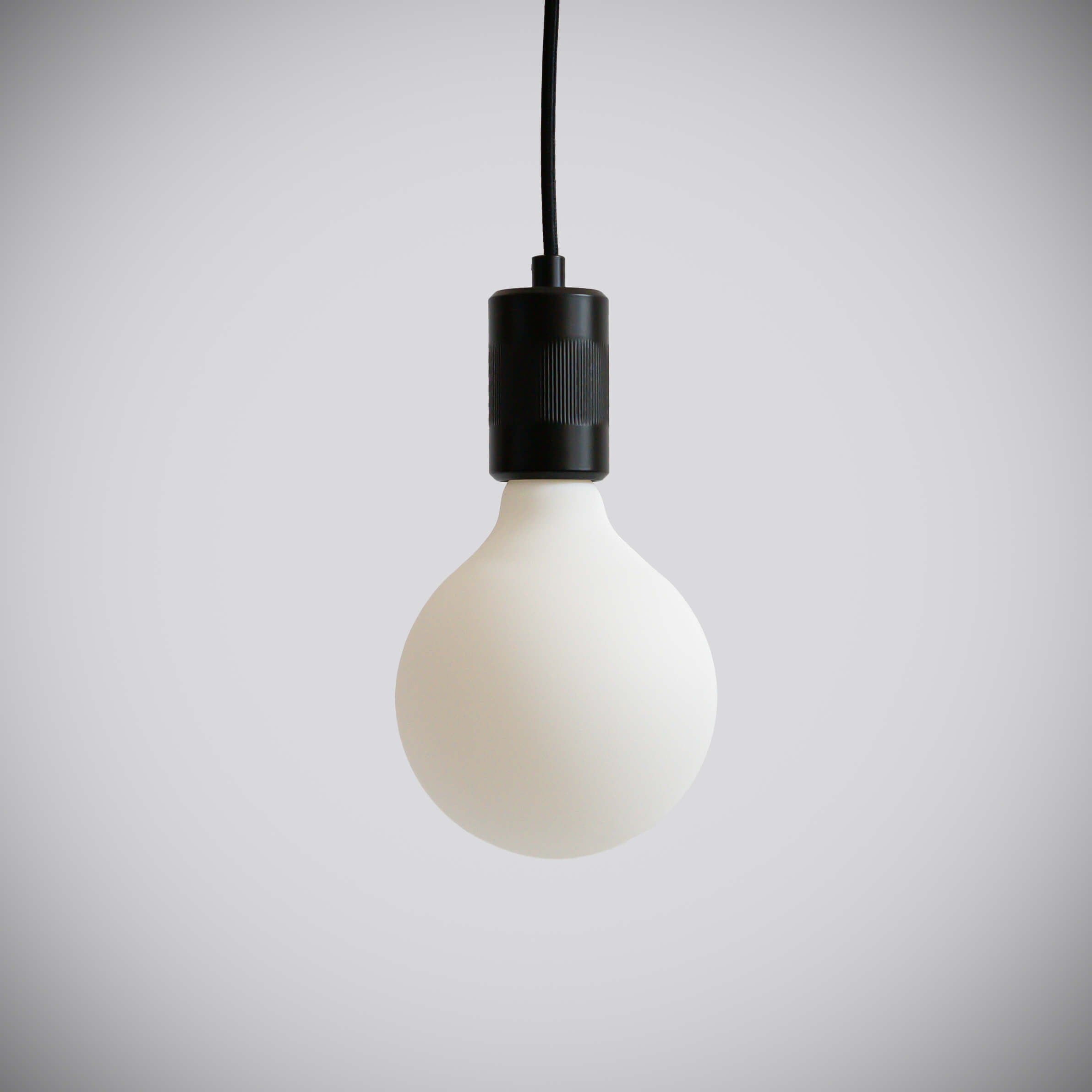 matte black pendant light and luna bulb off