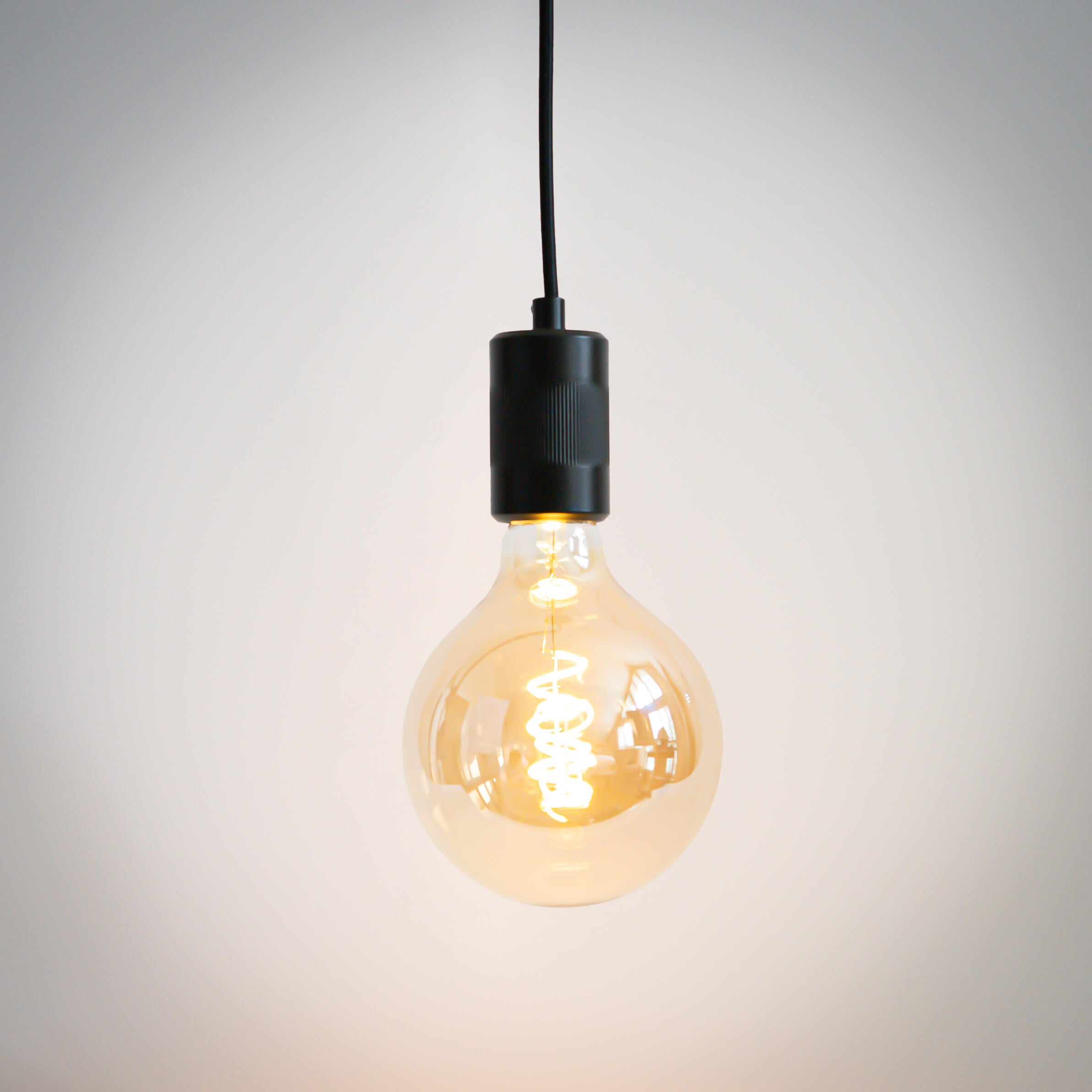 matte black pendant light and sophia bulb on