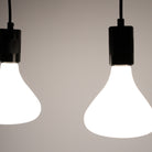 matte black triple pendant light with astrid bulbs