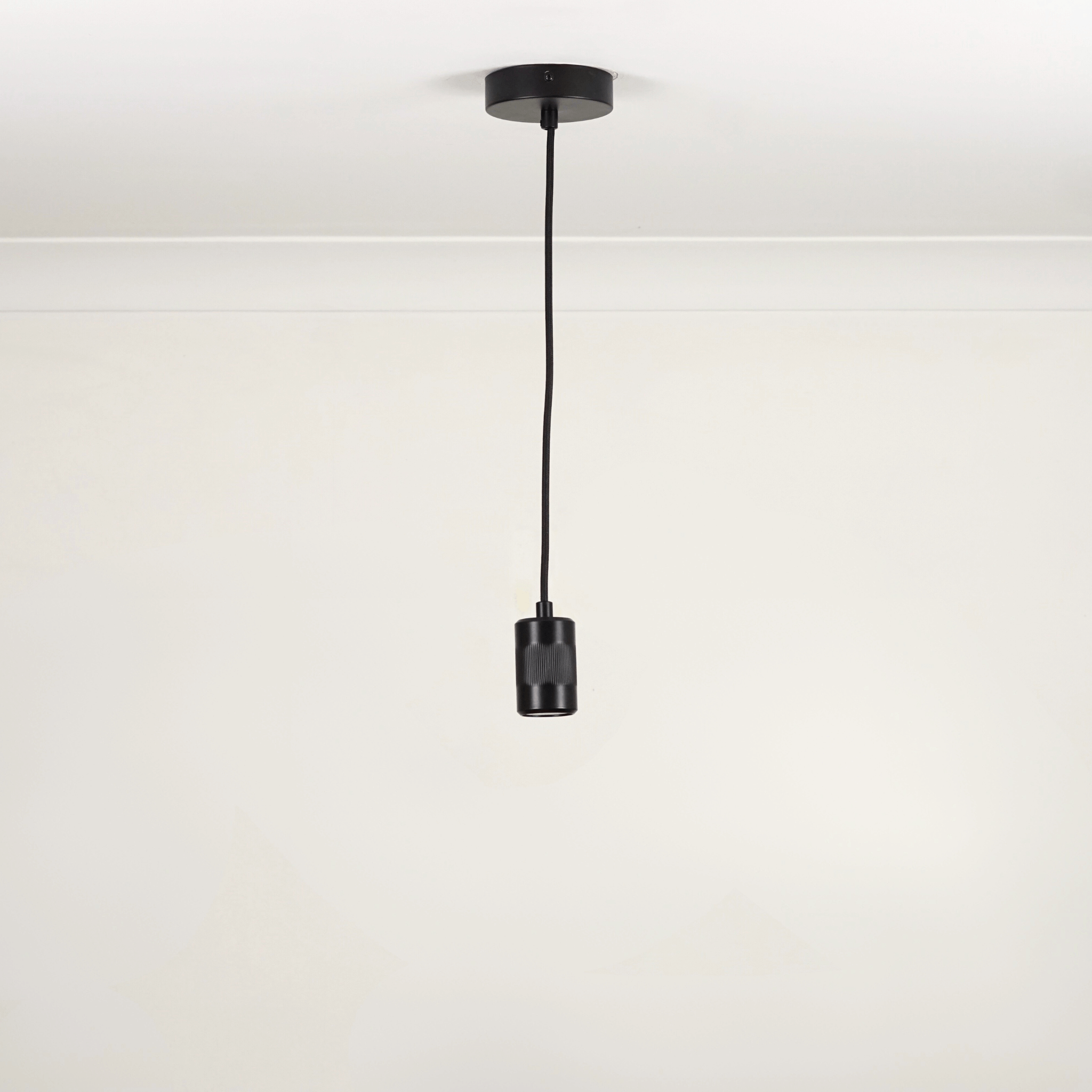 Black single pendant white background