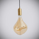 brass pendant light with twisted cable and céleste bulb off