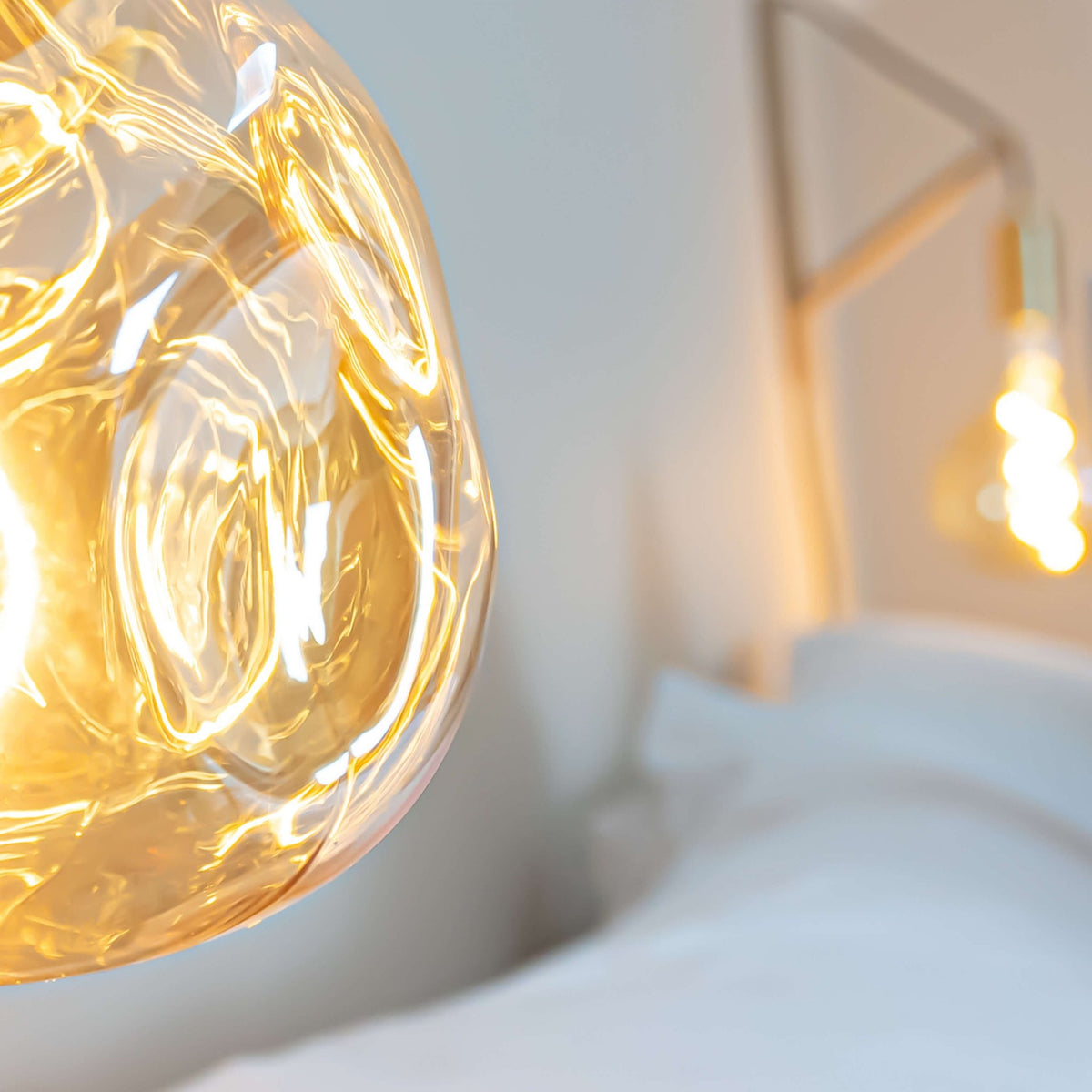 isabella brass plug in bedside light closeup bulb 