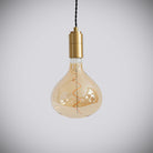 brass pendant light with twisted cable and olivia bulb off