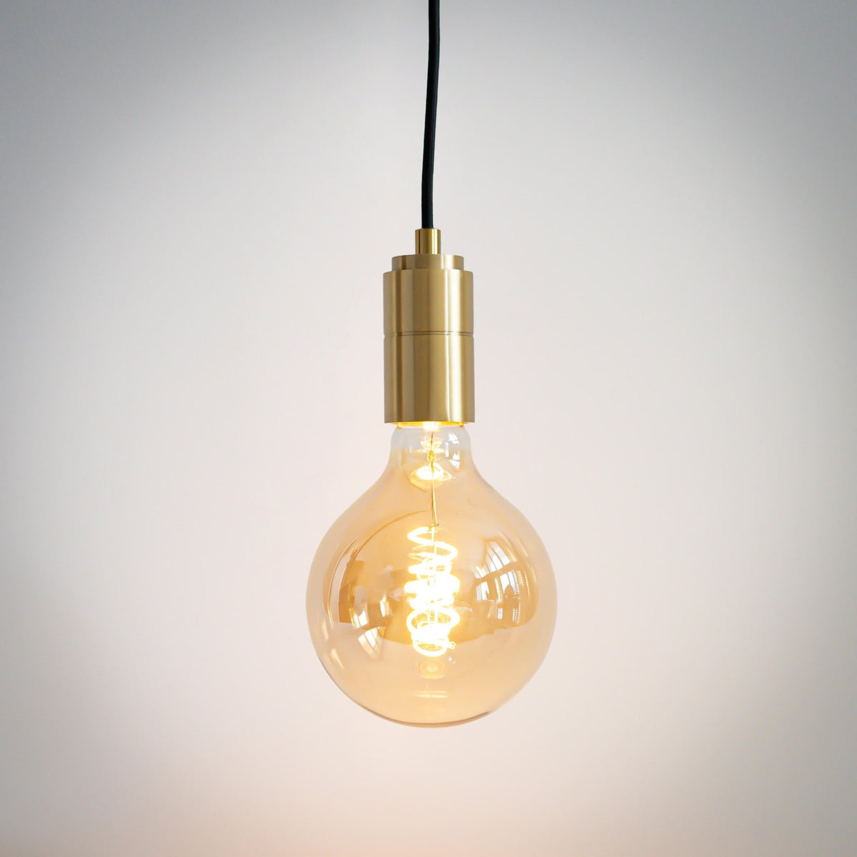 brass pendant light with straight cable and sophia bulb on